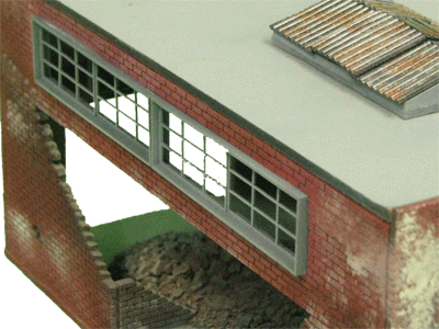 Factory support wall with new window insert.
